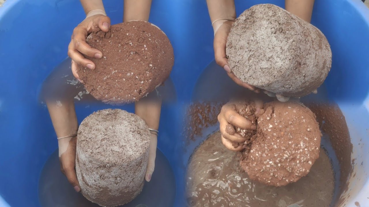 Red dirt with white concrete huge shapes and chunks dry water 💦 crumbling