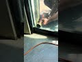 Unexpected accident when worker drills glass
