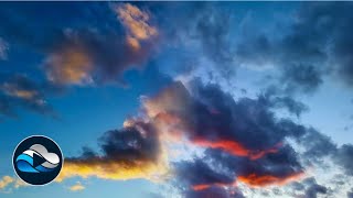 Glowing sunset clouds drifting from orange into purple time lapse Relax in Nature with Cloud Observe