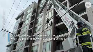 Two workers hanging off an eight‑story building rescued in Sacramento