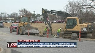 Construction crews battle cold temps