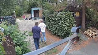 Man Falls Flat Moving Pallet from Shed Door