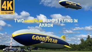 2 Goodyear Blimps Flying in Akron. Wingfoot Two and Wingfoot Three