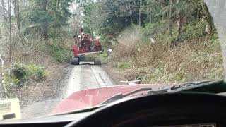 Following the yarder down the logging rd.