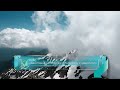 فيديو قمم الجبال المغطاة بالثلوج والغيوم بدون حقوق للمونتاج 4K