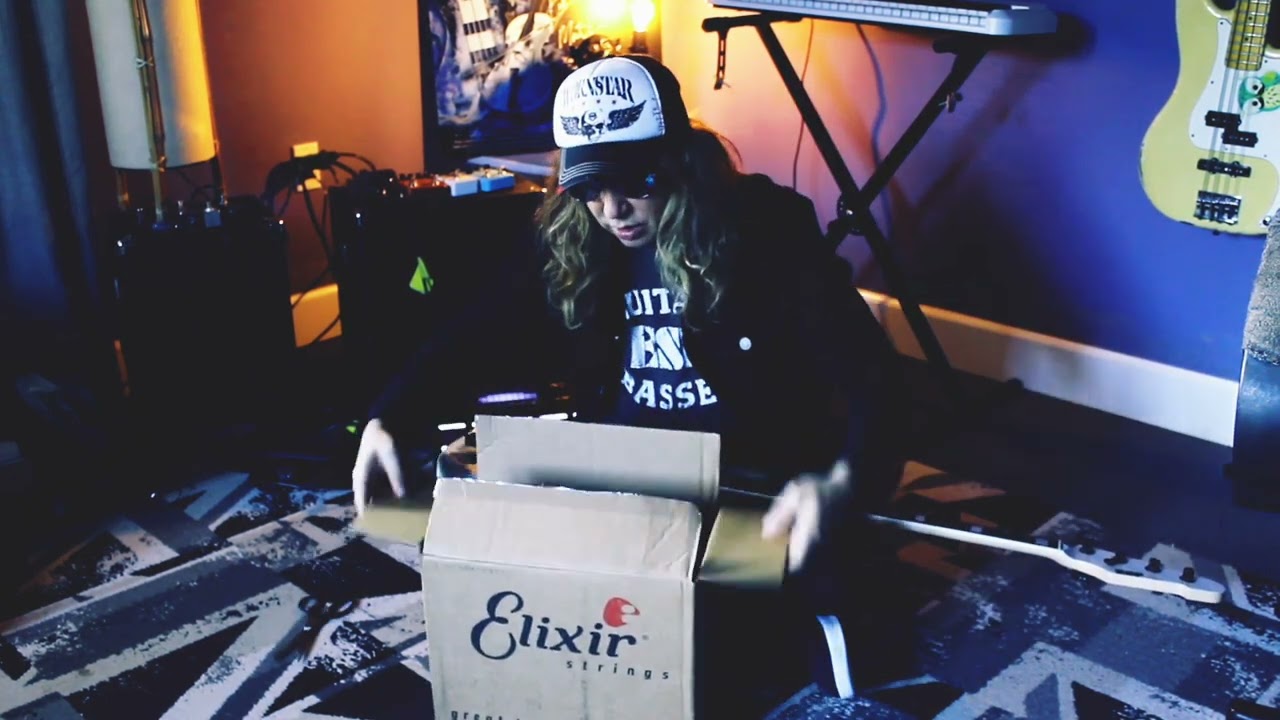 Marten Andersson Bass Player from Lita Ford is unboxing his Elixir Strings.