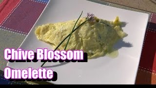Chive Blossom Omelette with Garden Spinach and Goat Cheese