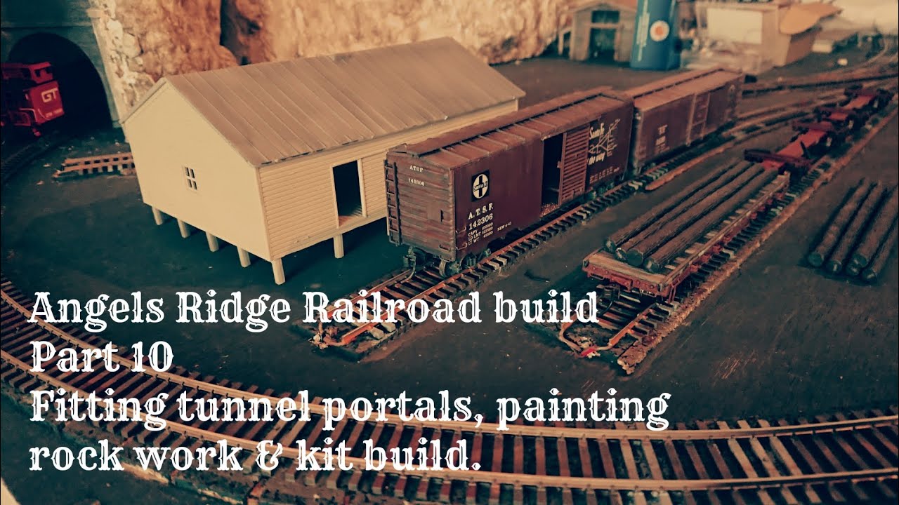 Angels Ridge Tunnel portals, rock work painting and kits from Walthers. It's all go ...