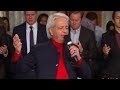 Benny hinn sings hes here right now lord we praise