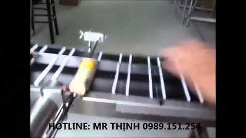 Máy in phun LINX   In code date trên chai.