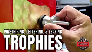Pinstriping, gold leafing and lettering Texas Thaw drag race trophies