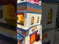 Department 56 North Pole Village Hot Wheels Detail Center Set of 2 Building and Figure 6014683