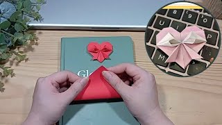 A simple guide to folding a heart-shaped paper bookmark