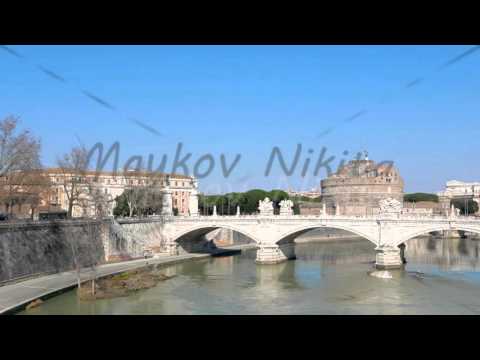 San Angelo behind ponte Vittorio Emanuele II. Tiber, Rome, Italy. 4K