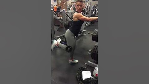 Standing glute kick back with weight behind the knee