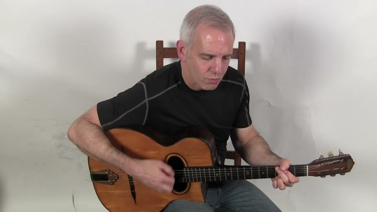 1930s Busato 12 Fret D Hole - YouTube
