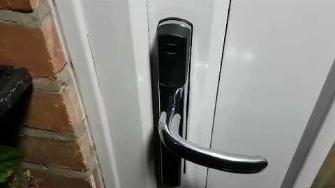 Simeon Tuitt UK Smart Lock Being Unlocked With A Smart Watch Phone To Get Into Smart Home Fast