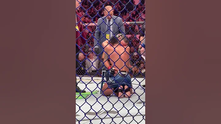 Chris Gutierrez embraces Frankie Edgar after their...