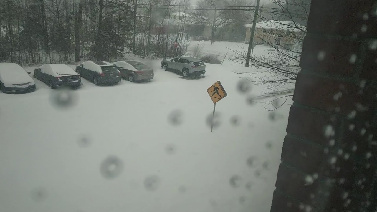 Snow Storm in Atlantic Province New Brunswick Fredericton Snow Cleaning from Car Laborious