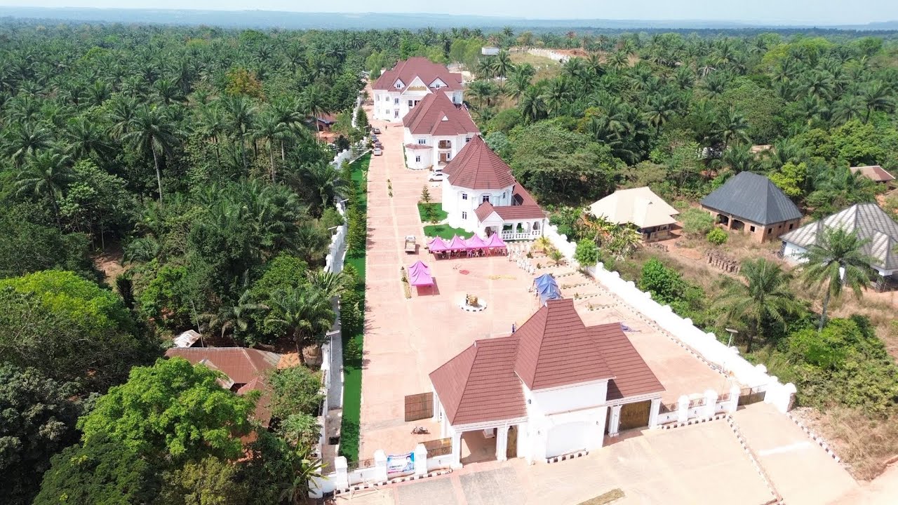 Billionaire DonChris built mansions across the village…but how did he make the money, and why here