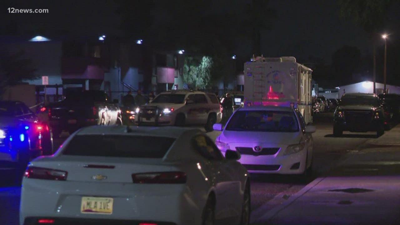 Suspect in custody after shooting Phoenix police officer, authorities ...