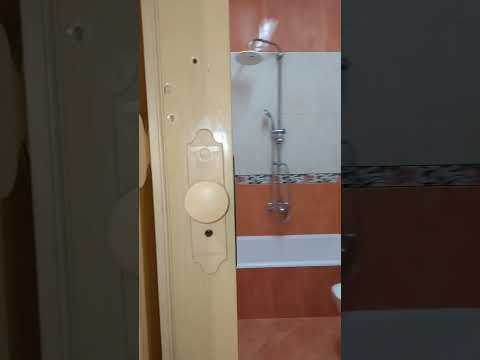 شقه للايجار فاضى فى اكتوبر الحي الرابع المجاوره الأولى خلف سنتر على الدين