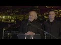 Julian Assange's father speaks in front of the Home Office in London.