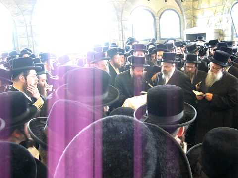 Bobover Rabbi Saying "Yehi Ratzon" At The Ohel