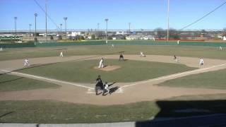 Hard hit ball off 400 foot wall with wood bat.