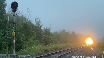 Dual flags! CP 5907/5936 leading Continuous Welded Rail train (Jul 9, 2021)