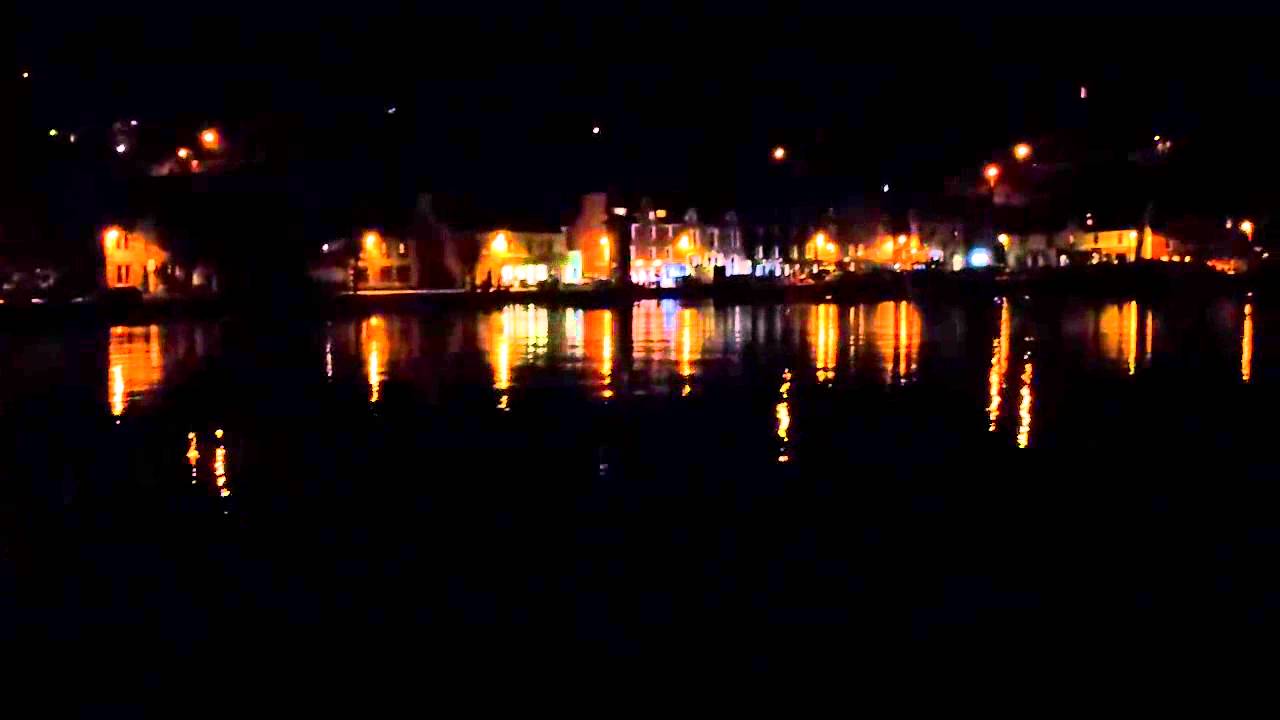 Derek McGeehan In his Mini WRC on Tobermory Harbour