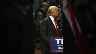 Trump stares down racist protesters