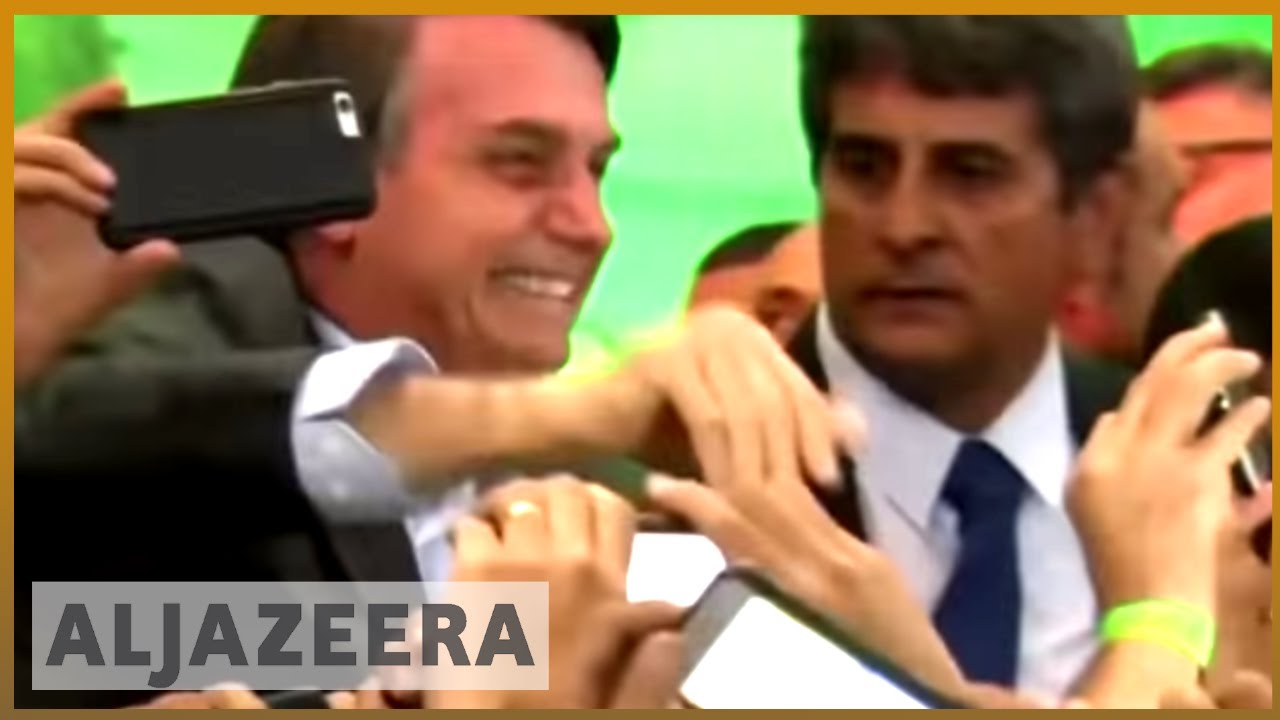 🇧🇷 المرشح الرئاسي البرازيلي بولسونارو في حالة خطيرة بعد تعرضه للطعن | الجزيرة الإنجليزية