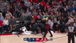 Massive tray of drinks gets spilled when ref bumps into courtside waitress