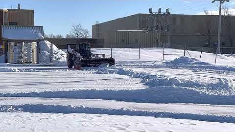 Bobcat S76 with 9’ Bobcat pro Pusher (Kage Innovations)