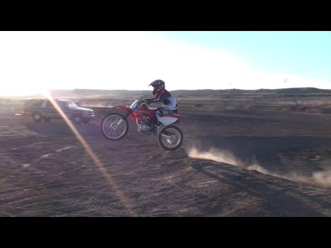 Dirtbike Devin big air jumps with CRF100F slowmo and Gopro hang time 意味