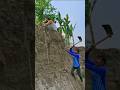 A man cuts through the mountain behind