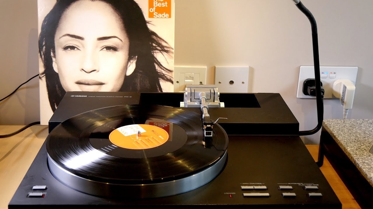 Best of Sade vinyl record with turntable