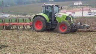 Claas Axion 850 au labour avec une charrue Kuhn 6 fers.....