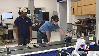 Apprentice program pays students to learn a trade.