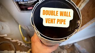 Hot water heater vent pipe installation