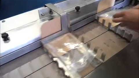 Header card applicator machine