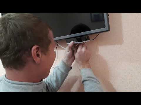 Как прикрепить приставку к телевизору на стене