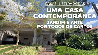 CASA CONTEMPORÂNEA COM JARDIM E ARTE POR TODOS OS CANTOS