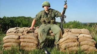 Alright well here are some pics of me in diff types gear.or vietnam
impression(no not a reenactment). just my gear, fatigues.doing what i
do...