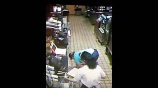 Dunkin' Donuts employee drops tray of donuts on the ground then serves them