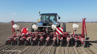 Sugar beet drilling with New Holland T5050 on duals and Kverneland 12 - row seeder