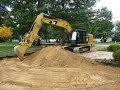 Cat 316e excavating for driveway using trimble gcsflex system