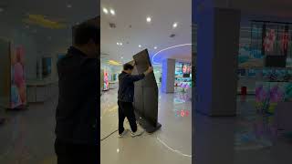 Watch multiple foldabel LED display come together to form one seamless large screen