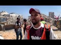 انتشال رفات شهداء من تحت أنقاض مبنى التاج  الذي دمره القصف الأسرائيلي في مدينة غزة